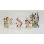 Six Staffordshire pottery figures, mid 19th century, comprising a highlander spill vase, 32cm