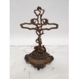 Victorian cast iron stickstand, the back formed as hound and stag, the drip tray surmounted by