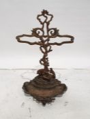Victorian cast iron stickstand, the back formed as hound and stag, the drip tray surmounted by