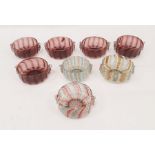 Three Venetian latticino glass ice cream bowls with cherub head mask handles and five amethyst