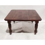 19th century mahogany extending dining table, the rectangular top with moulded edge, canted corners,