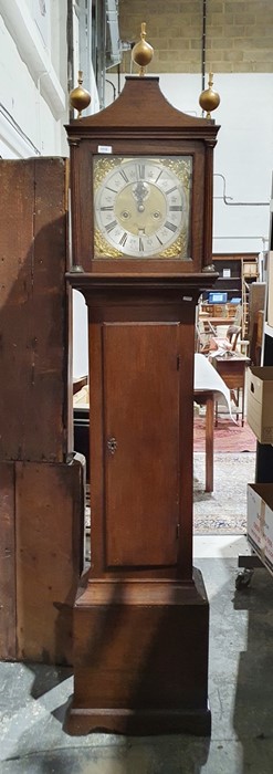 Oak longcase clock with raised pediment, having curved sides, three ball finials, square brass