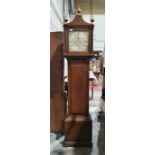 Oak longcase clock with raised pediment, having curved sides, three ball finials, square brass