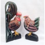 Two modern carved and painted wood cockerels, 59cm and 40cm high (2)