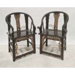 Pair of Chinese armchairs, black painted and gold coloured finish, carved and pierced back splat