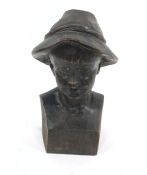 Late 19th/early 20th century hand carved bust of boy wearing feathered hat, 30cm high approx