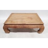 Oriental-style coffee table in limed-effect finish, the rectangular top on four carved supports,