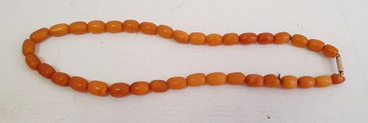 Short string of yellow amber beadsCondition ReportApprox. weight 10.6g