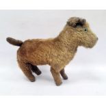 Early 20th century gold plush and straw stuffed toy dog, 32cm long (worn)