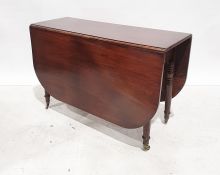 19th century mahogany drop-leaf table, the rectangular top with rounded corners on turned supports