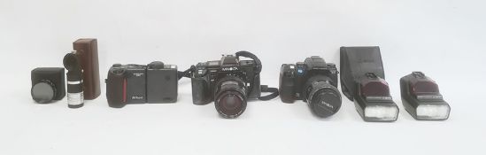 Konica Minolta camera, a Minolta 7000 camera and other camera equipment (1 box)