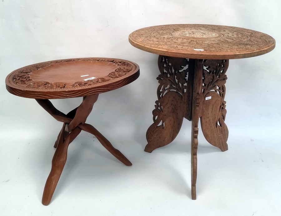 Two Eastern-style carved circular coffee tables (2)