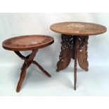 Two Eastern-style carved circular coffee tables (2)