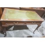 Edwardian library/writing table stamped 'Gillow', with green leather inset top and mahogany frame,