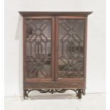 19th century mahogany two-door wall-hanging cabinet, the ogee moulded cornice above astragal-