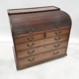 19th century mahogany roll-top desk with fitted interior above two short and three long graduated