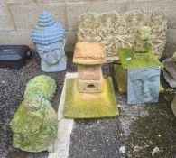 Collection of Eastern inspired garden ornaments to include blue painted head, seated Buddha, etc (6)