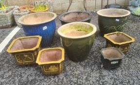 Assorted glazed planters in blues, greens and browns, largest 47cm diameter (8)