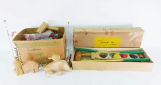 Collection of wooden toys, wooden animals, wooden skittles and a boxed junior croquet set by