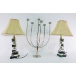 Two mirrored glass cube table lamps with a tea light holder and a shield shaped modern toilet mirror