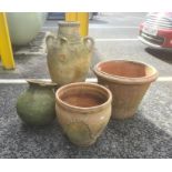 Terracotta garden ornament in the form of an amphora, poppy seed head-shaped planter and two clay