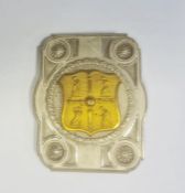 Cricket interest: Stamped and embossed metal buckle with shield representing four players, 6.5cm x