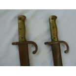 Two 19th century French bayonets with scabbards (rusty)Condition ReportSerial numbers on blades and