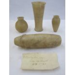 Four ancient Egyptian alabaster vessels with note '4 alabaster jars from the desert 23-1-47' (4)