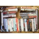 Militaria, three boxes of books and DVDs on the subject of war, to include Burt & Leasor "The One