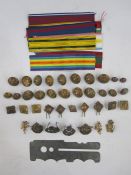 Box of ATS cap and collar badges together with WWI army buttons and medal ribbons