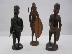 Carved Masai figure with his kill, 30cm high, a Kenyan carved man with rooster, 30cm high and an
