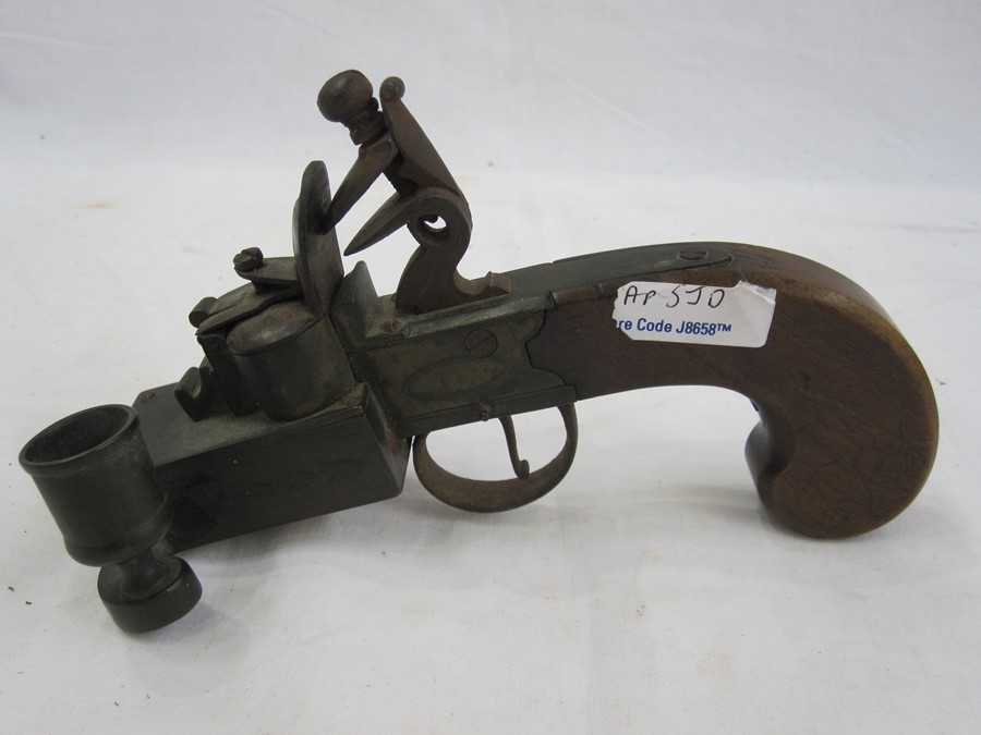 19th century flintlock table lighter with engraved brass mounts and mahogany scroll