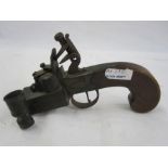 19th century flintlock table lighter with engraved brass mounts and mahogany scroll