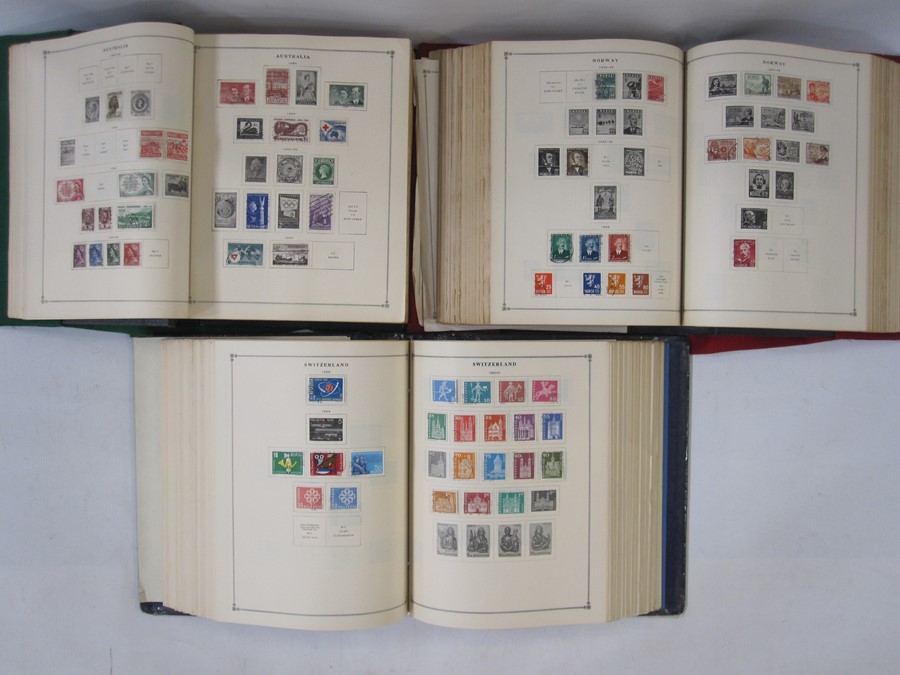 Three part-filled albums of World stamps (3)