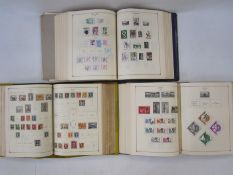 Three part-filled albums of World stamps (3)