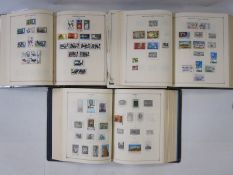 Three part-filled albums of assorted World stamps (3)