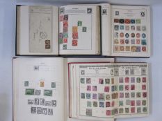 Four albums of sparsely filled stamps of the World, one envelope of mostly loose stamps (5)