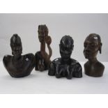 Carved bust of a Kenyan woman, circa 1980's, 32cm high, a Kenyan bust of a man, circa 1970's, 26cm