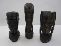 Pair of Tanzanian male and female carved figure heads, circa 1970's, 29cm high and a Tanzanian
