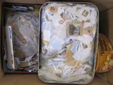 One box and contents of tins containing assorted stamps