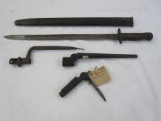 WWI 1907 patent bayonet, WWII Mk2 bayonet, 19th century socket bayonet (af) and a WWII penknife (4)