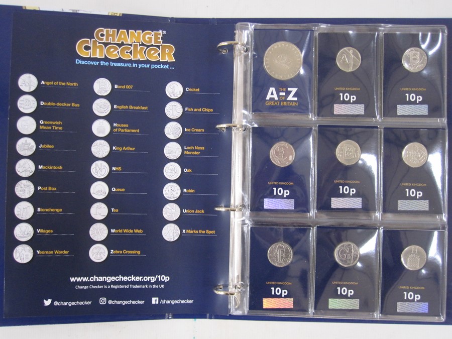 Collection of commemorative coins and stamps, eight folders worth to include complete set of 10p A-Z - Image 4 of 5