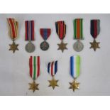 Imperial Service Medal named to "Godfrey Harris", eight WWII medals and stars, three are modern