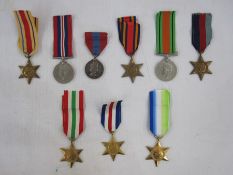 Imperial Service Medal named to "Godfrey Harris", eight WWII medals and stars, three are modern