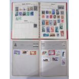 Two Junior stamp albums of mostly middle period stamps of the World