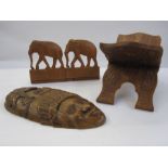 Pair of carved African elephant bookends, a carved book stand and a mask with palm trees (4)