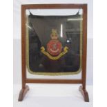 20th century oak firescreen with military hanging 'The Queen's Own Royal West Kent Regiment', 76cm