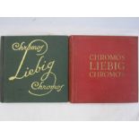 Two albums of trade cards 'Chromos Liebig Chromo's' including 'De Koppoortigen', 'De Kalevala', '