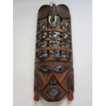 African mask with carved animals of elephant, giraffe, lions, 40cm long