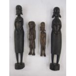 Pair of hardwood carvings from West Africa, female figures and two other wooden figure carvings (4)